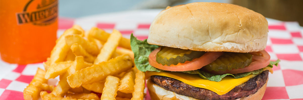 cheeseburger with french fries basket with a drink