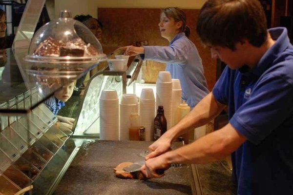 scooping ice cream at pistol pete's ice cream