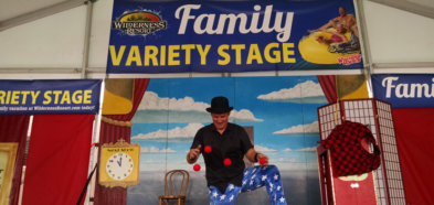 man juggling at the wisconsin state fair at the wilderness variety stage