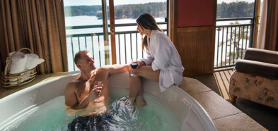 couple in a got tub at wilderness at the lake