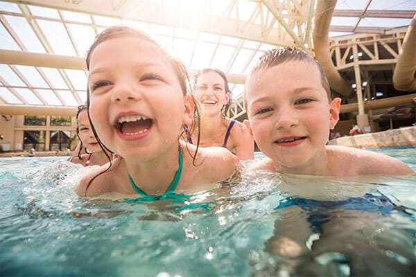 children in the wave pool