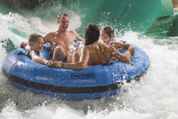 Dueling Mammoths family raft ride inside The Wild WaterDome