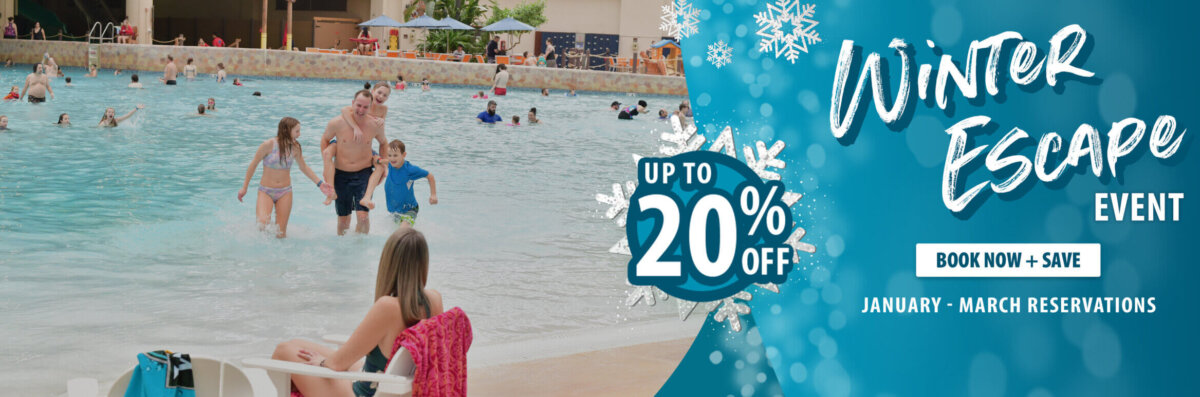 A family plays and splashes in an indoor water park pool. A lifeguard watches from a chair. Text reads “Up to 20% off Winter Escape Event” with the Wilderness Resort logo and website at the bottom.