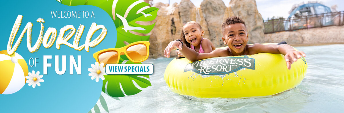 Two children smile while floating in a yellow tube at a waterpark beside “Welcome to a World of Fun” promotional text.