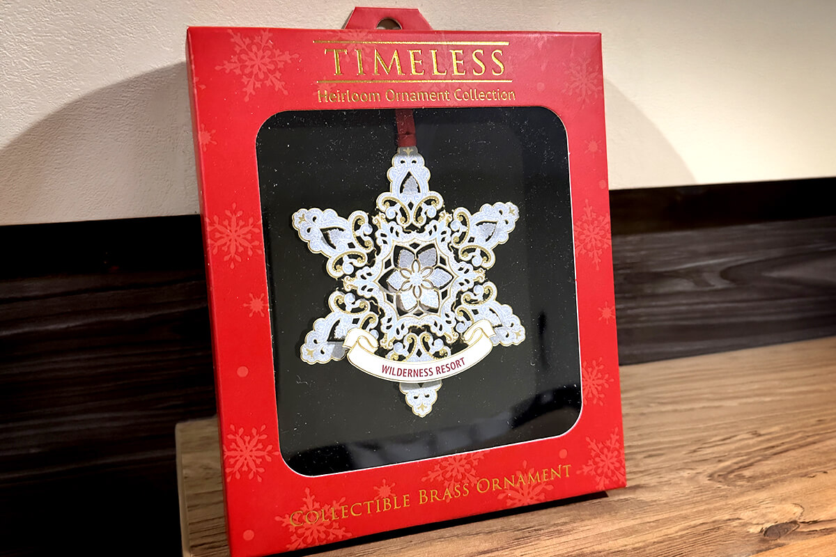 Christmas Tree Rental keepsake ornament at Wilderness Resort 2026. Looks like a snowflake the Wilderness branding on it